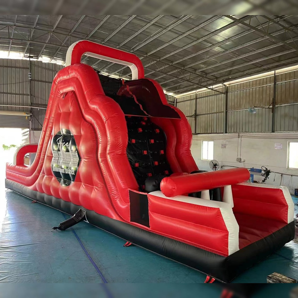 red obstacle course inflatable