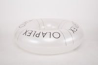 White circular object with 'OLAPEX' branding on a white background