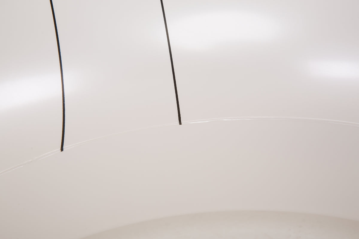 Close-up of a white transparent ring tube 