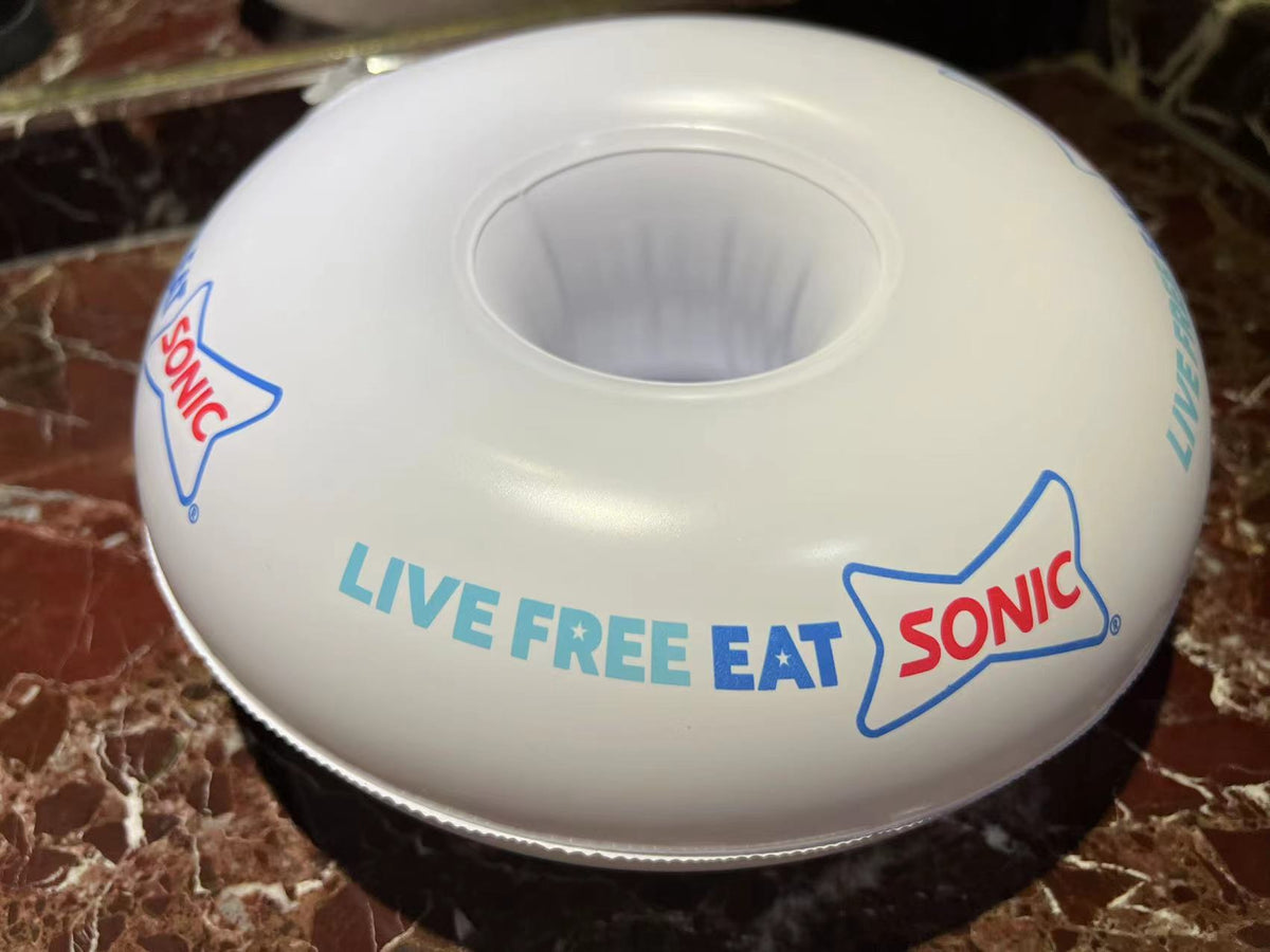 White donut-shaped container with Sonic Drive-In branding on a marbled surface