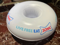 White donut-shaped container with Sonic Drive-In branding on a marbled surface