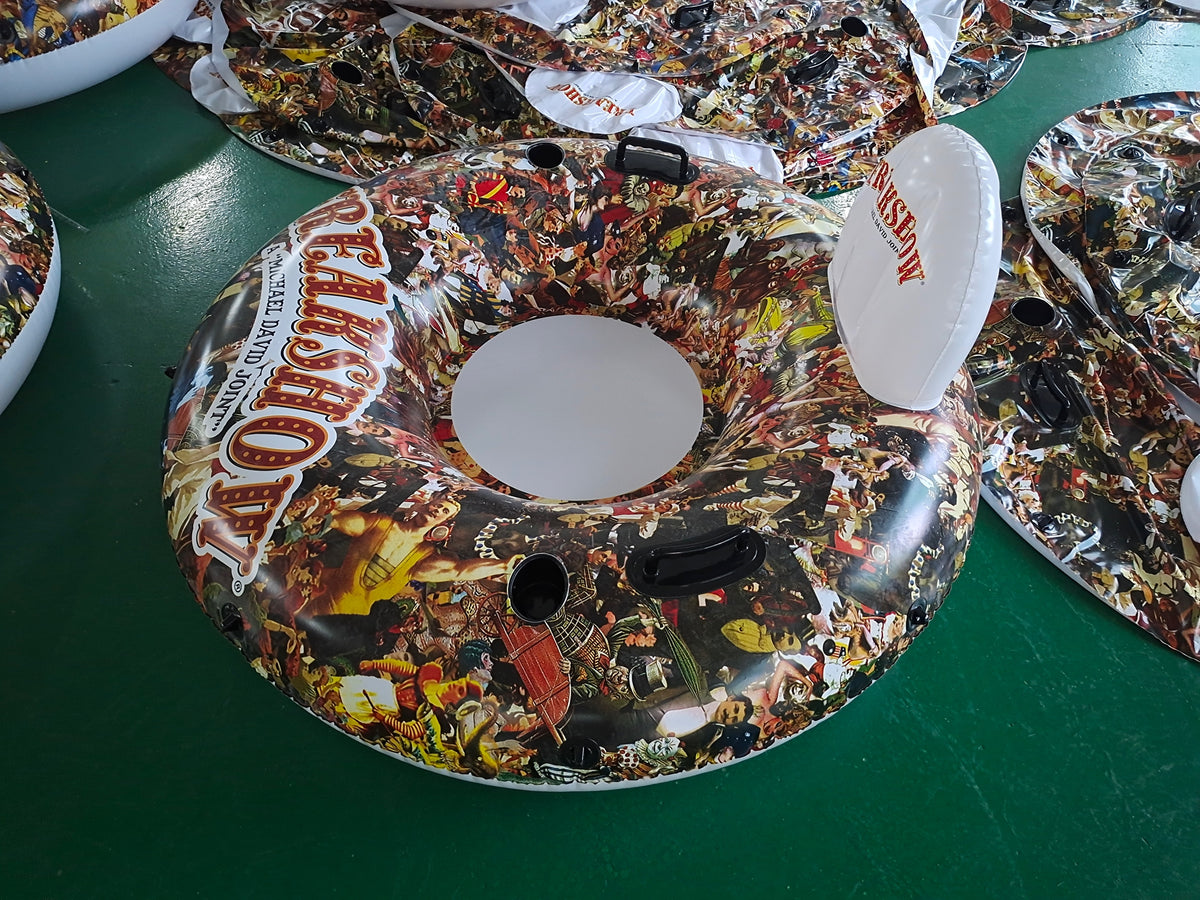 Decorative Lazy Susan with colorful design on a green surface