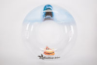 Clear ring tube with a blue handle on a white background, featuring the 'Positive Trim' logo.