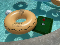 Inflatable donut float with branding in a pool